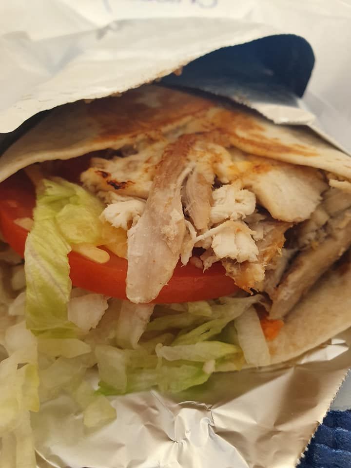 Chicken and Vegetable Wrap with Lettuce, Tomato and Onion — Mount Louisa Snack Bar in Mount Louisa, QLD