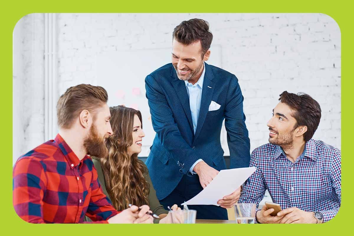 Young entrepreneurs discussing financial strategy at a desk.