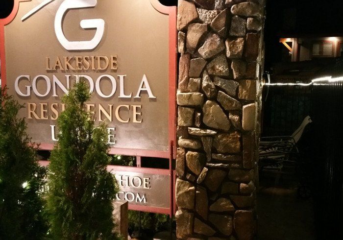 A sign that says lakeside gondola residence on it