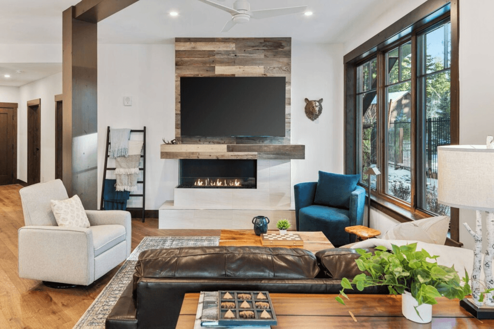 A living room filled with furniture and a flat screen tv.