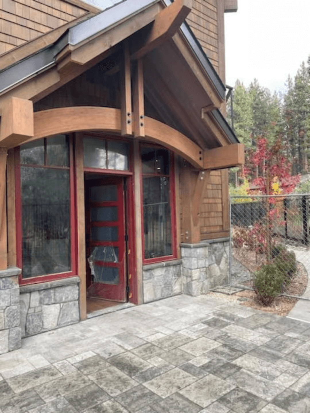 The front of a house with a red door