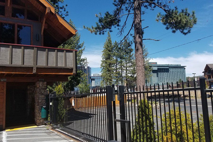 A house with a balcony and a fence around it