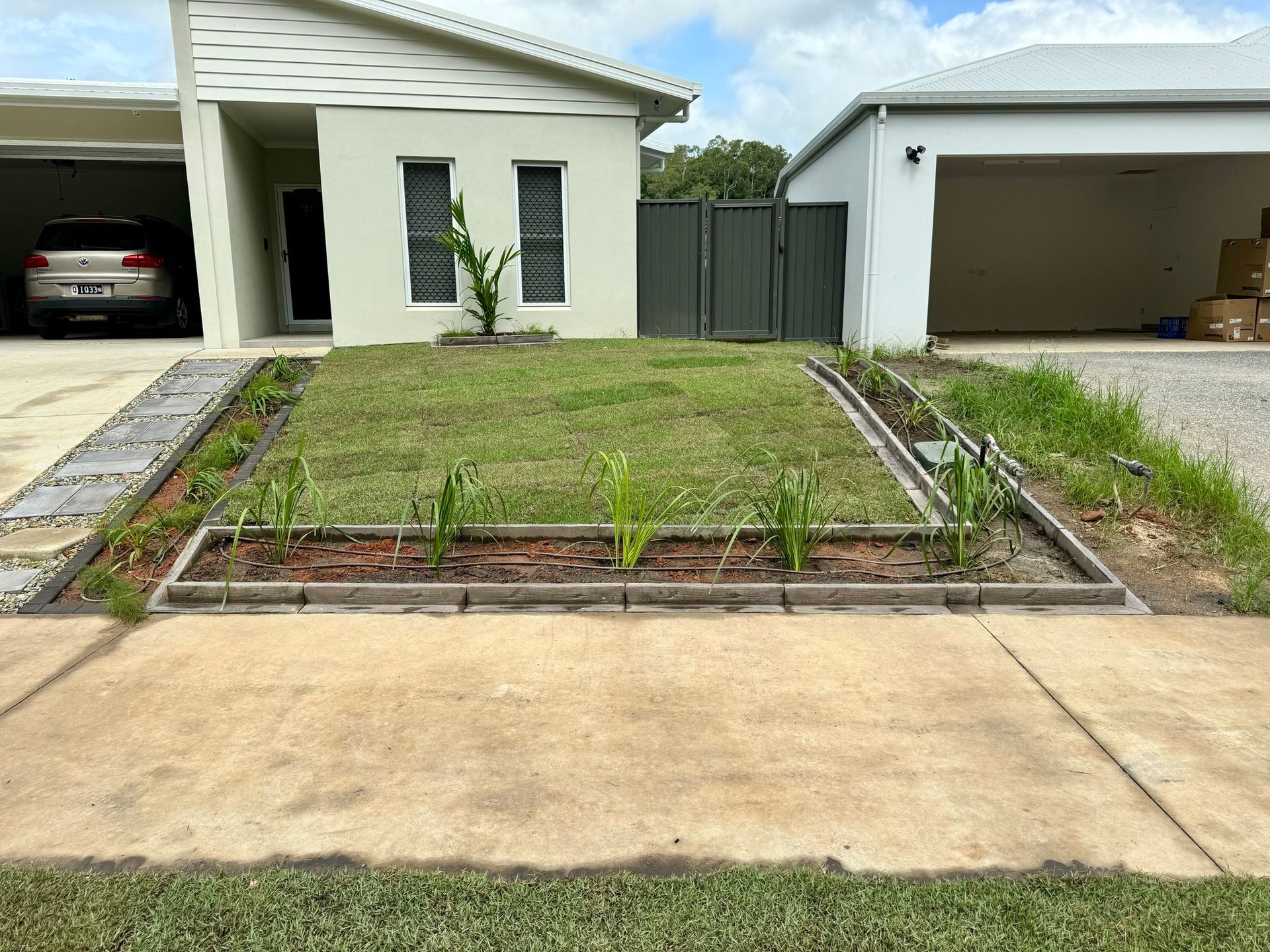 Backyard Garden With Grass Lawn And Plants — NQ Parks and Gardens in Cairns, QLD