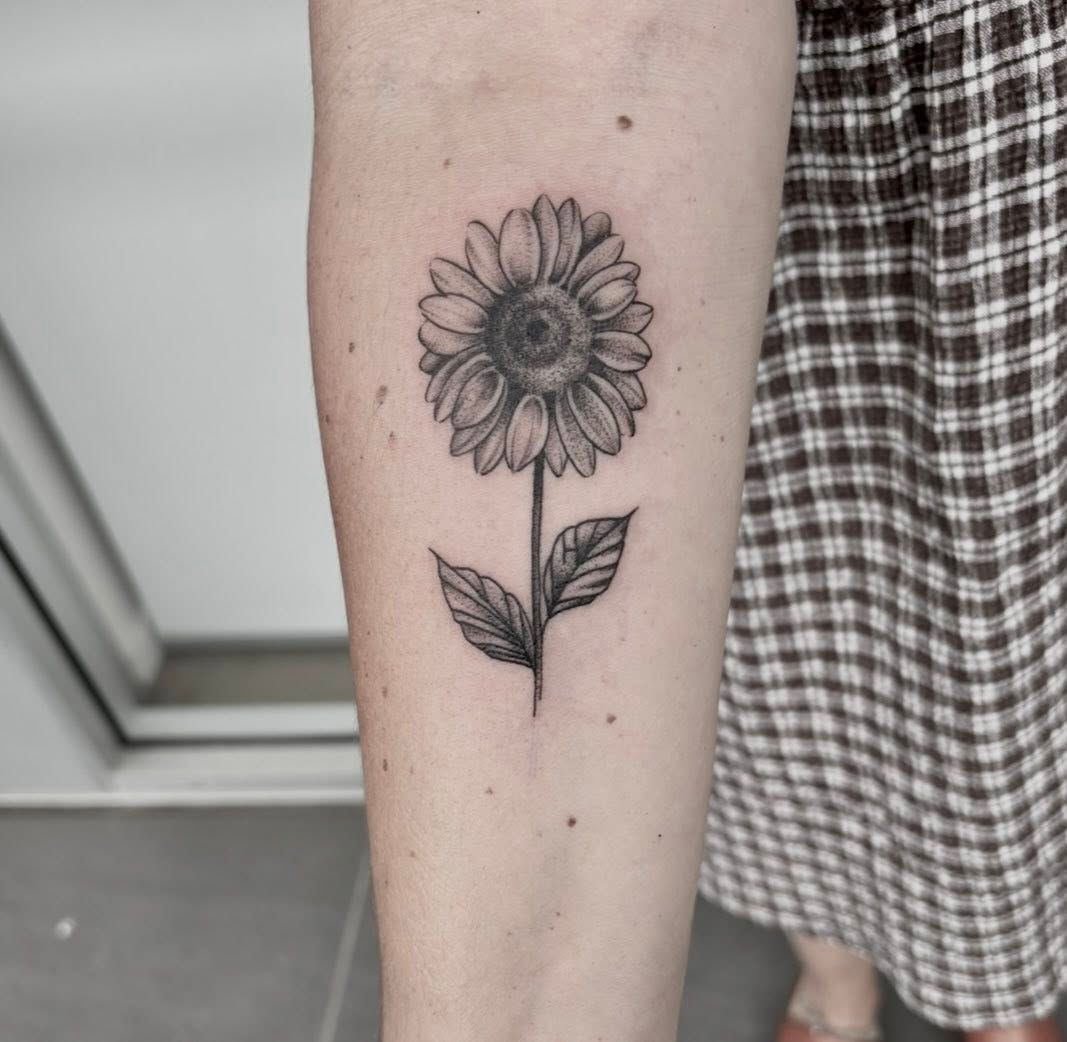 Black Ink Sunflower Tattoo on an Arm — Pins and Needles Tattoo in Trinity Beach, QLD