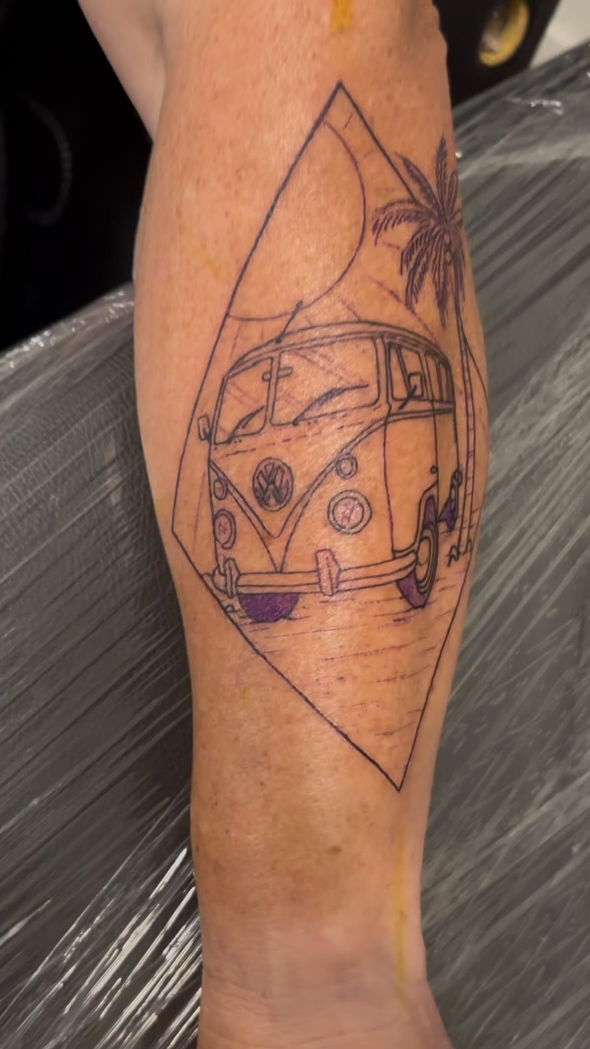 Tattoo of a Vw Bus on a Beach, Within a Diamond Outline on a Leg — Pins and Needles Tattoo in Redlynch, QLD