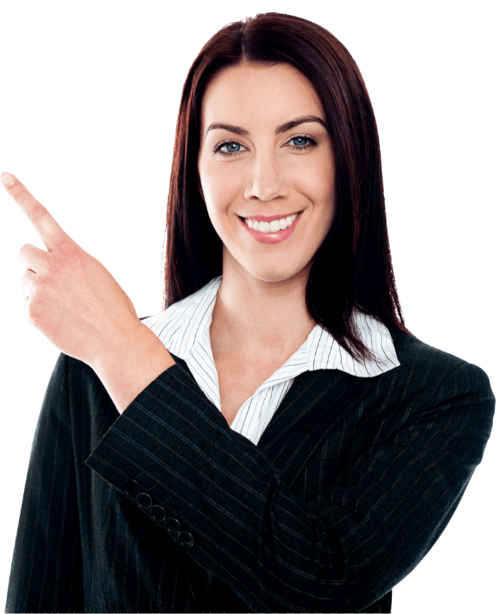 A woman in a suit is pointing at something with her finger.