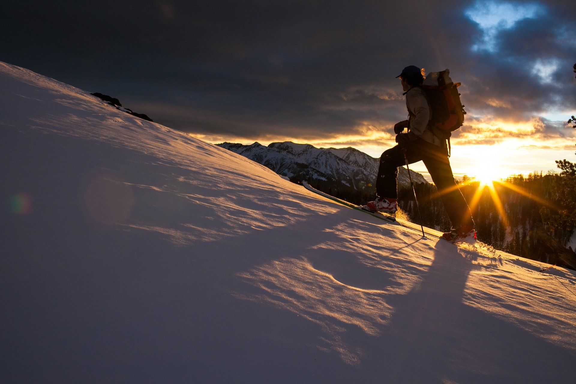 Dawn patrol backcountry skiing sunrise
