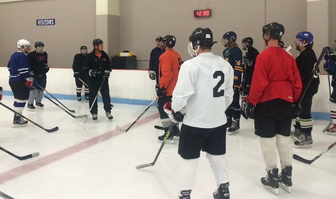 A hockey player with the number 2 on his jersey