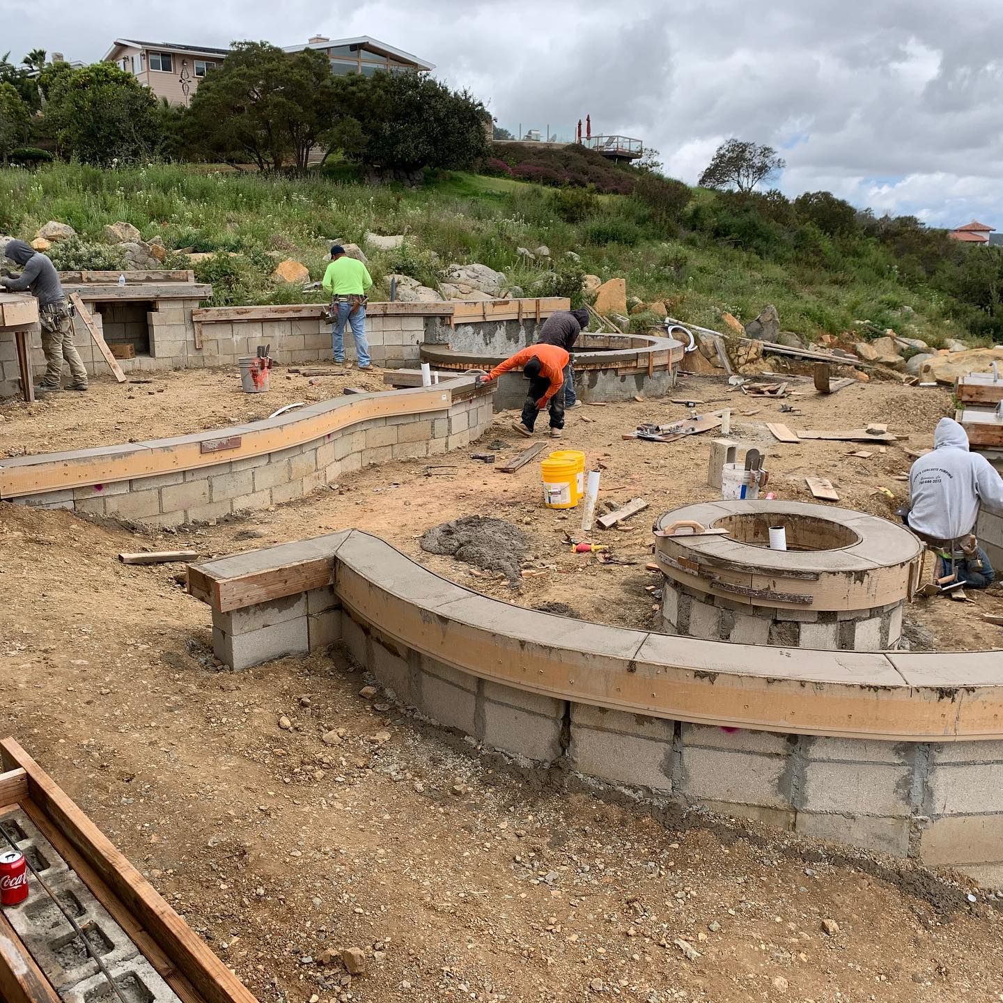A group of people are working on a construction site.