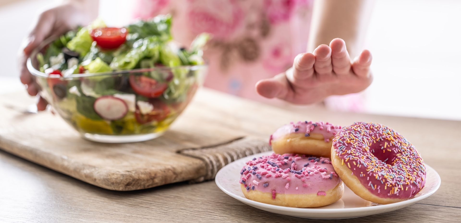 Woman passing up on a donut during her 10-day sugar cleanse