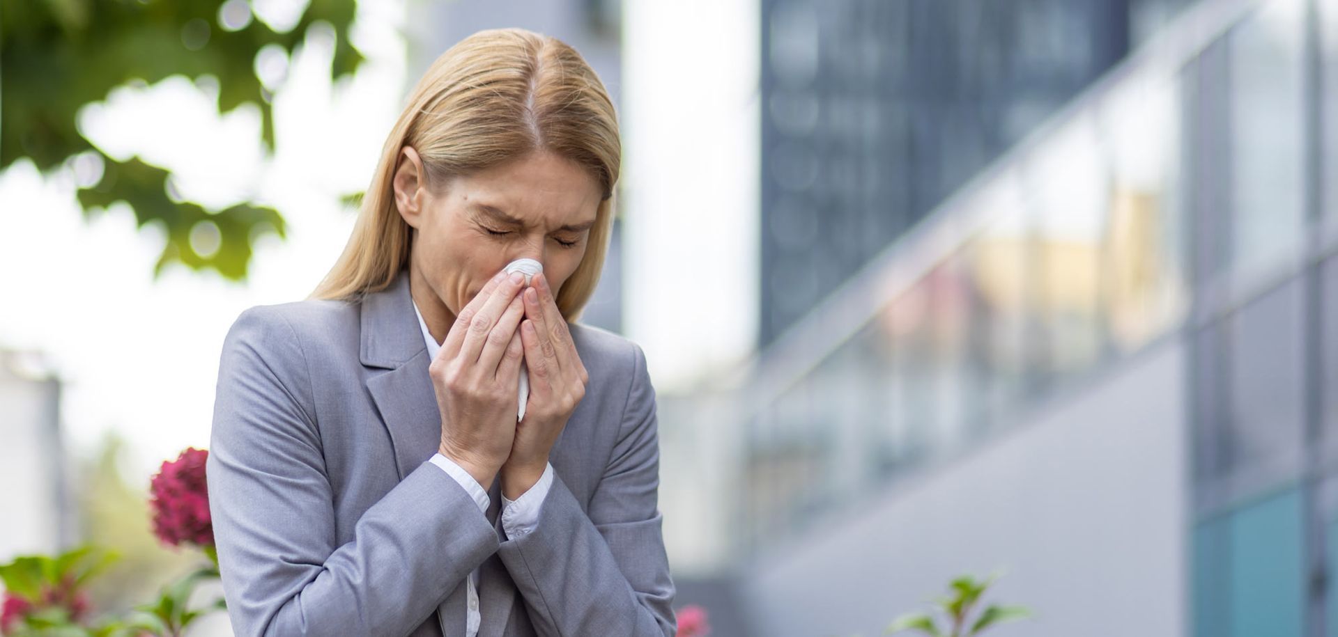 Woman Sneezing in Need of Relief from Seasonal Allergies