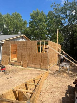 Partially built house with wooden framing