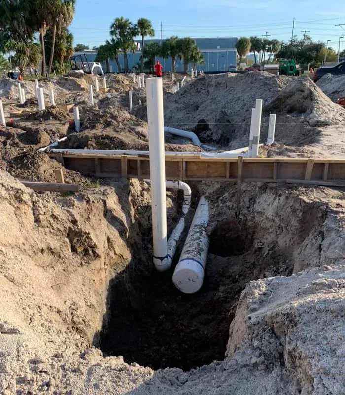 Drain Pipe is Being Installed in the Ground — Lutz, FL — Bella Plumbing LLC