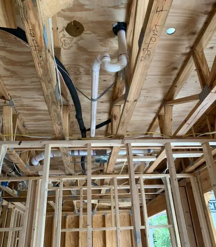 House with a Lot of Pipes Coming Out of the Ceiling — Lutz, FL — Bella Plumbing LLC