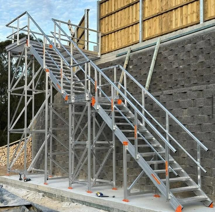 A Set of Stairs Going up A Brick Wall — Site Safety NSW in Sandgate, NSW