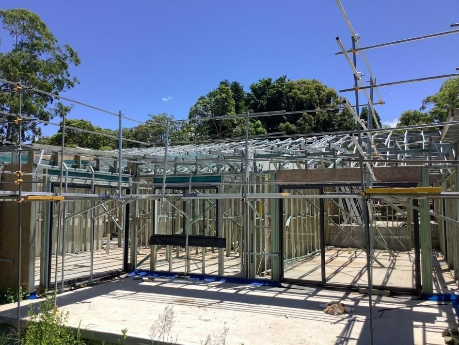 A Building Under Construction with Scaffolding — Site Safety NSW in Sandgate, NSW