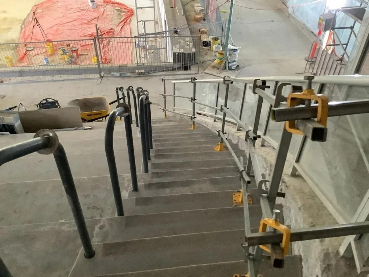 A Set of Stairs Leading up To a Building Under Construction — Site Safety NSW in Sandgate, NSW
