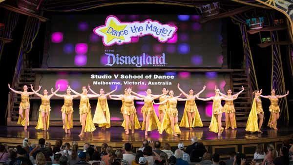 female dance group wearing gold