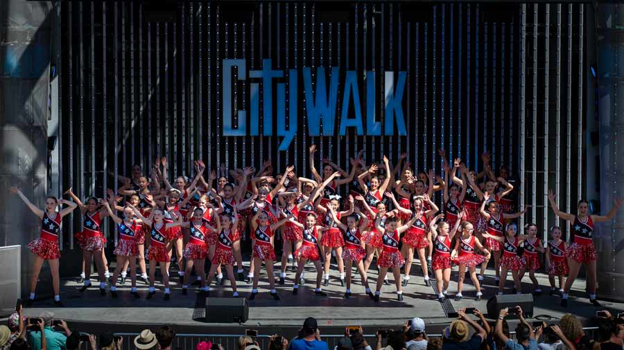 large dance group in red