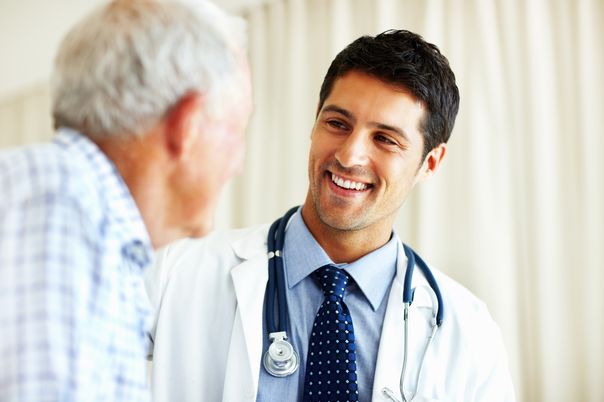 A healthcare provider and their patient experience the benefits of EHR data integration in chronic disease management.