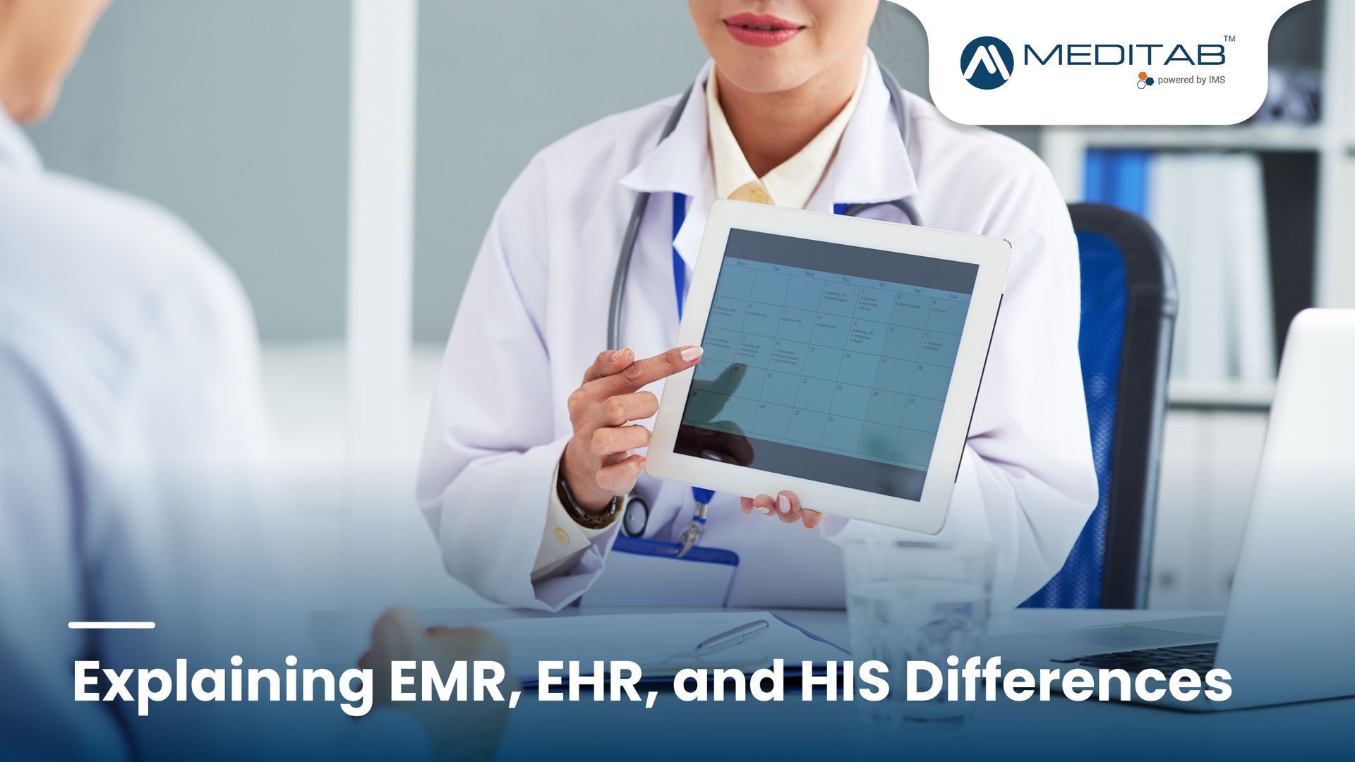 Medical staff discussing a computer screen, with text