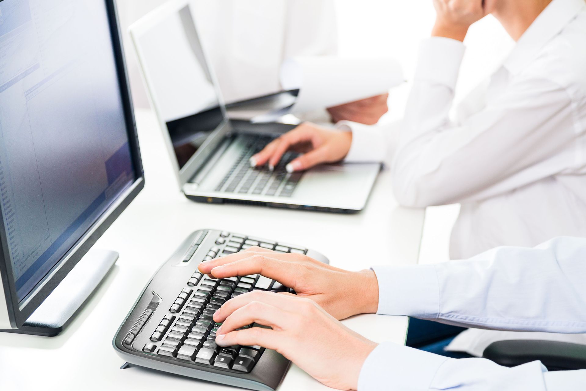 As part of their clinic’s healthcare billing process, a medical biller thoroughly reviews each claim before submission.