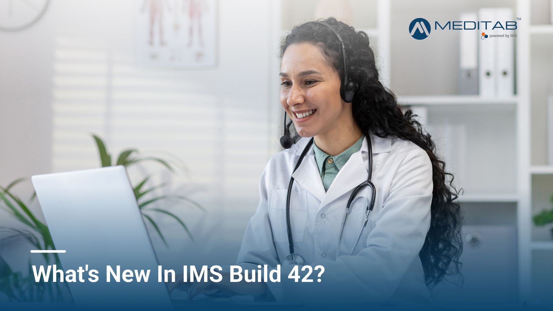 A doctor smiles while using a laptop with a headset on in an office setting. Text: What's New In IMS Build 42?