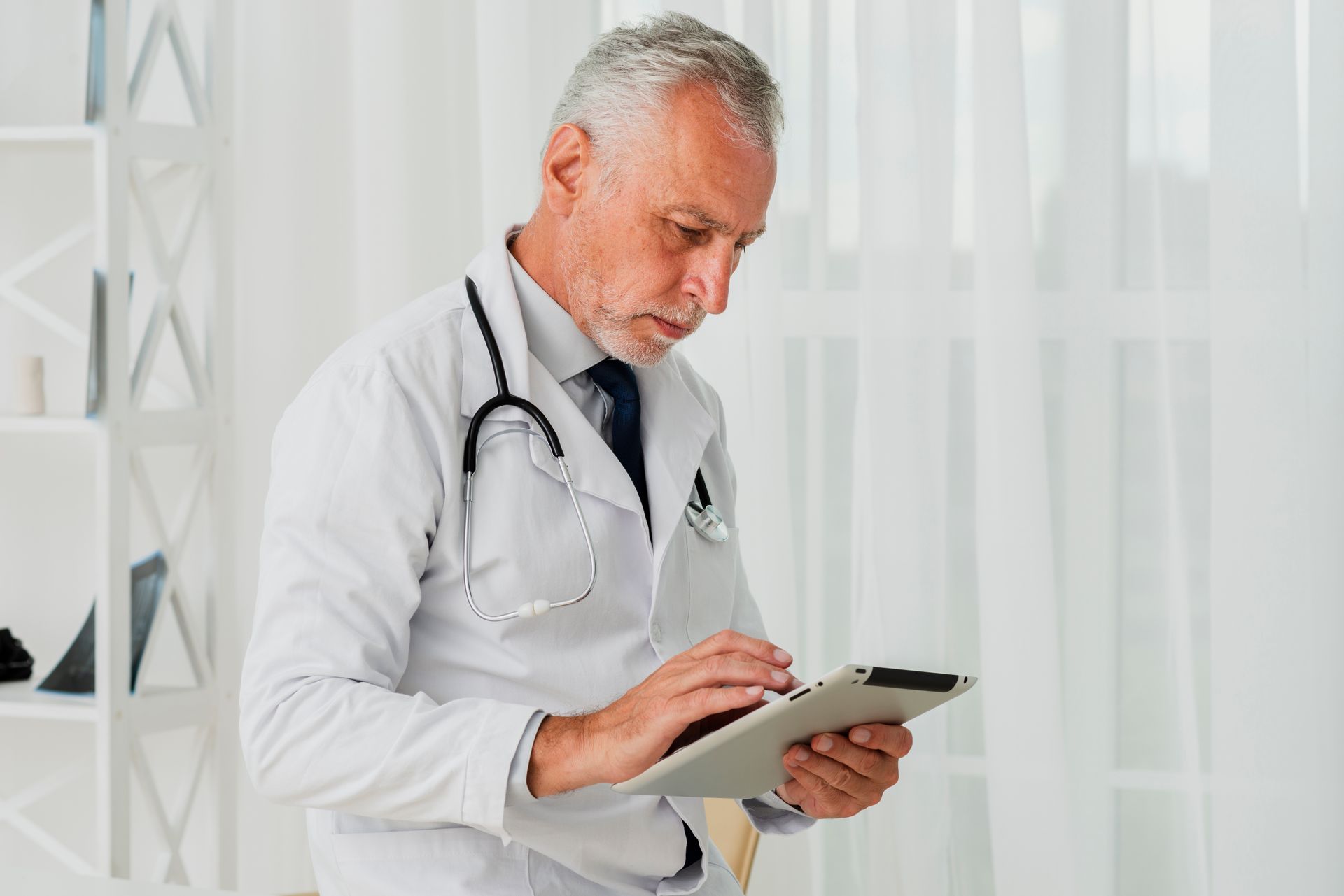 A healthcare professional utilizes Meditab’s patient engagement software to connect with his patients regularly. 