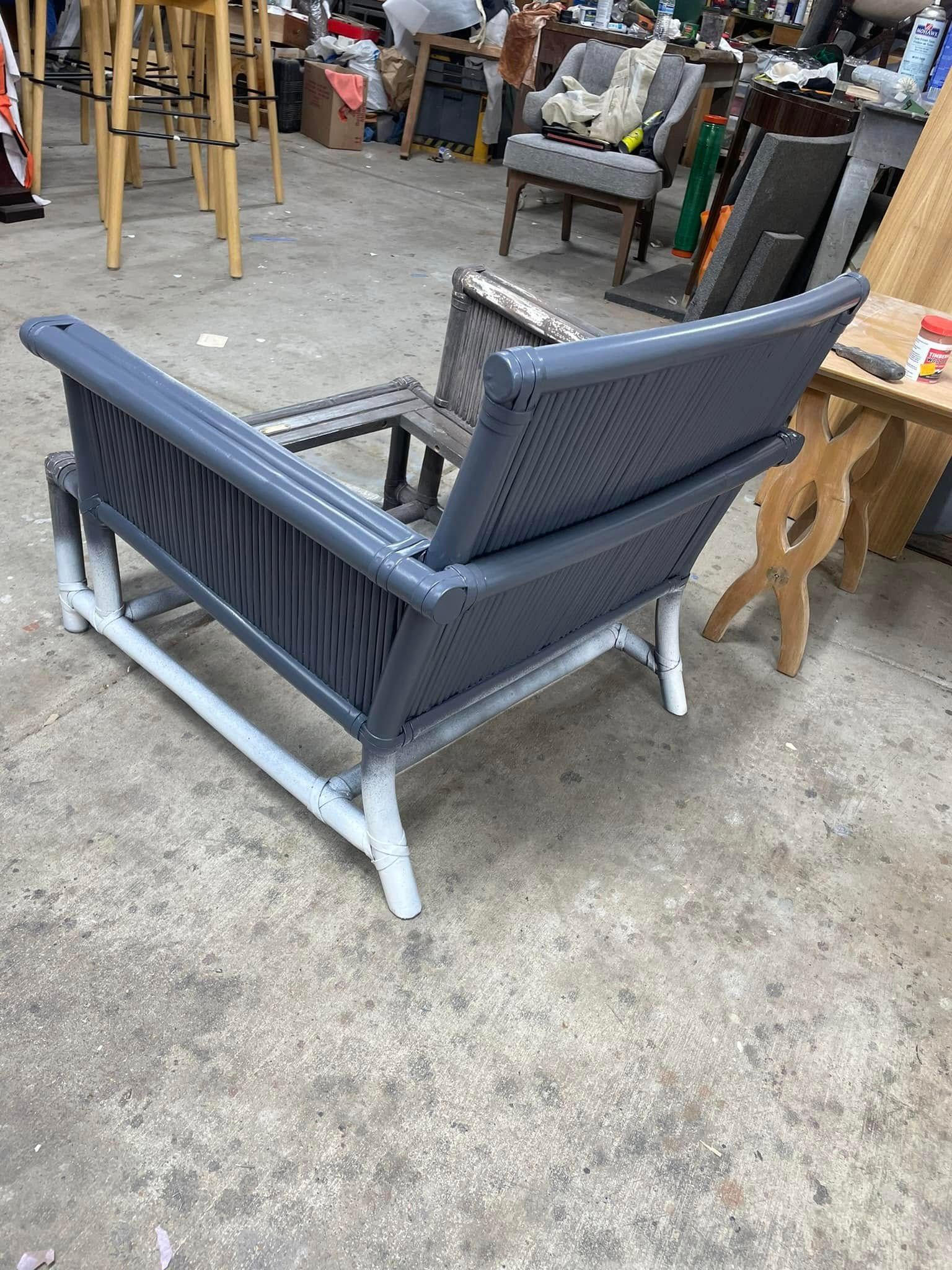 A chair is sitting on a concrete floor in a room.