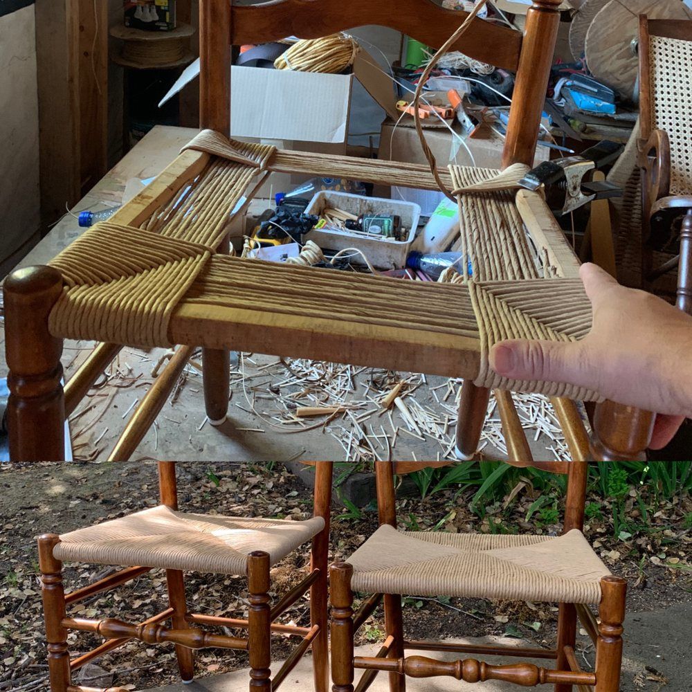 A person is working on a chair with a wicker seat