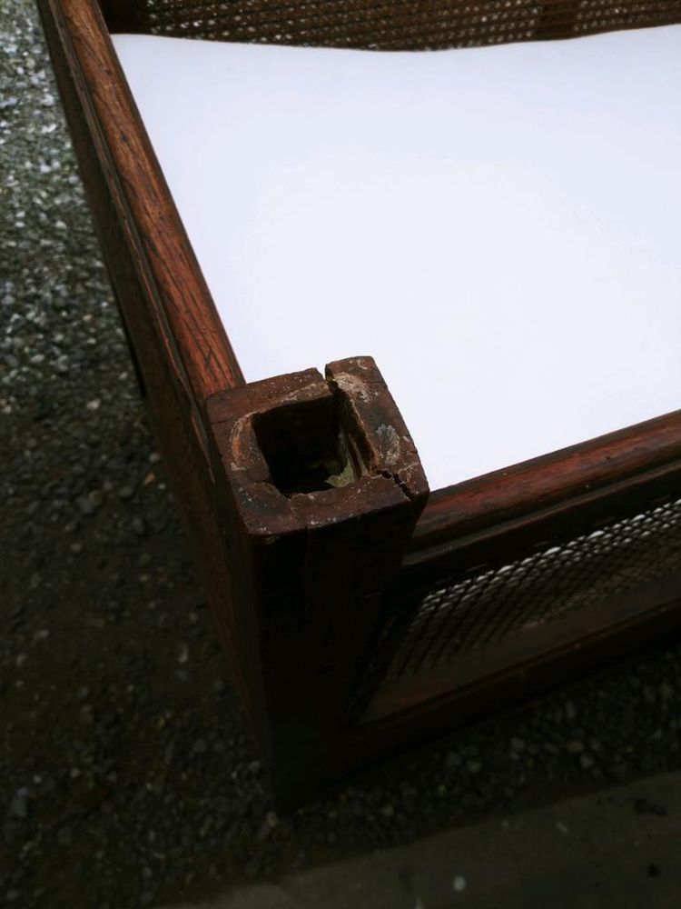 A piece of wood with a hole in it