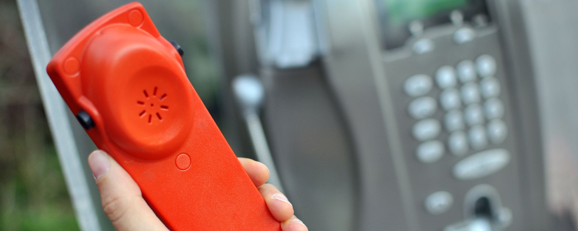Expert checking the repair work done on phone