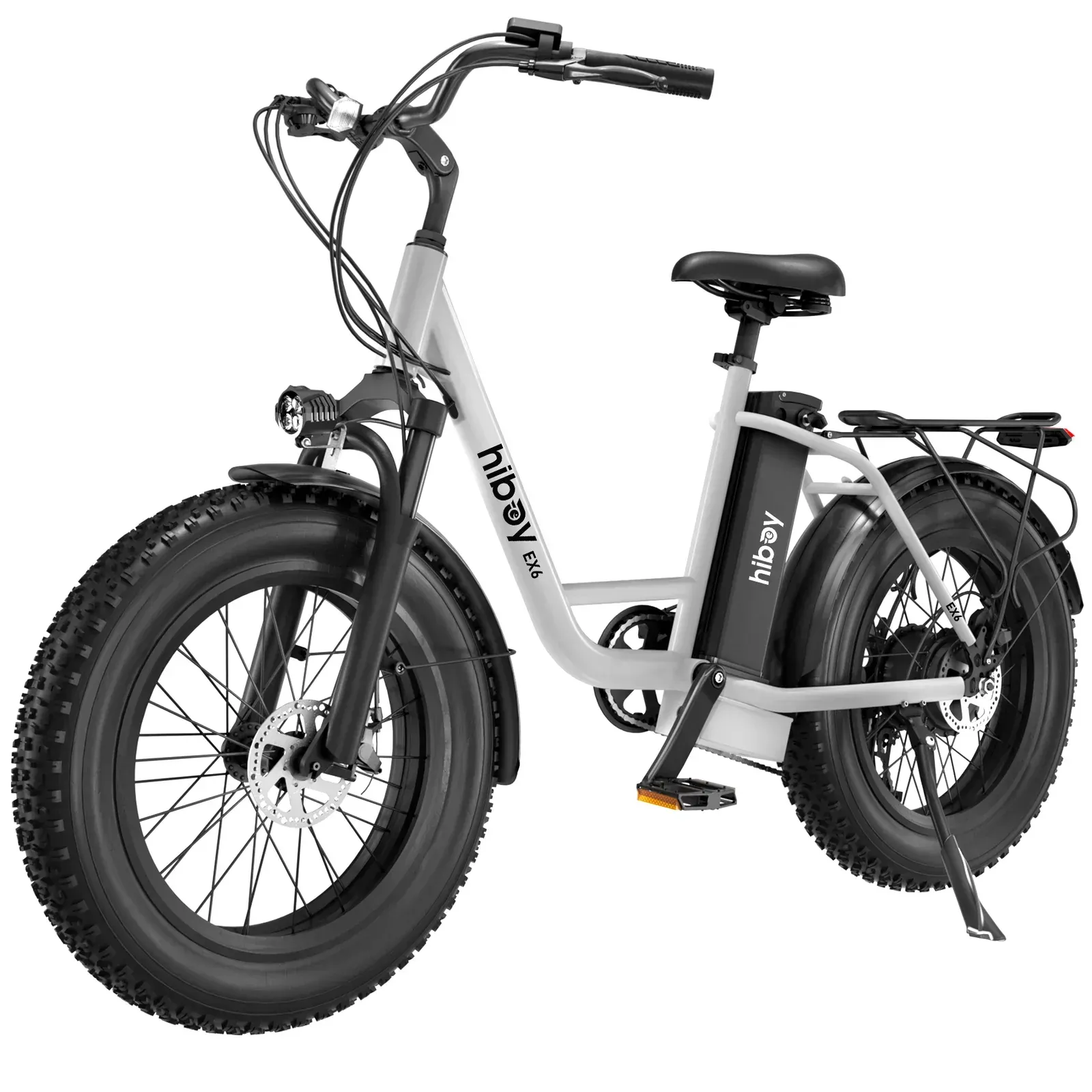 Black electric fat tire bike with cargo rack.