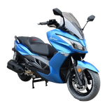 Blue motor scooter with black seat and windshield, parked on a surface.