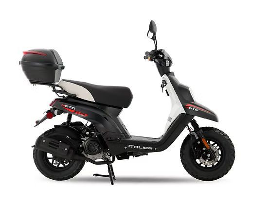 Black and white scooter with storage box, side view.