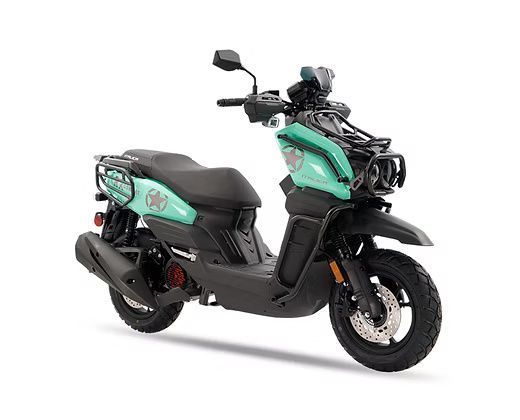 Green and black Yamaha Zuma scooter.