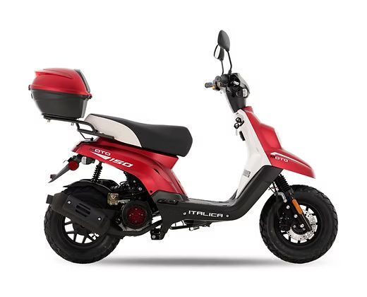 Red and white scooter with a black seat and storage compartment.