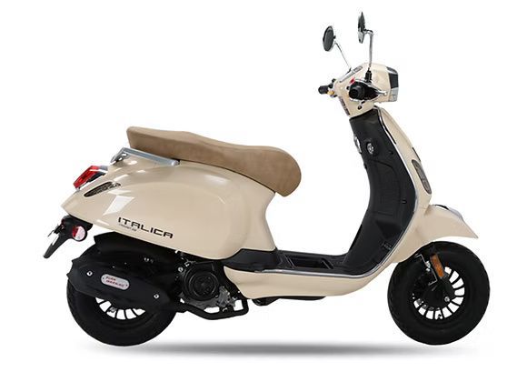 Cream-colored Italica scooter with a tan seat, black accents, and black wheels, shown in profile.
