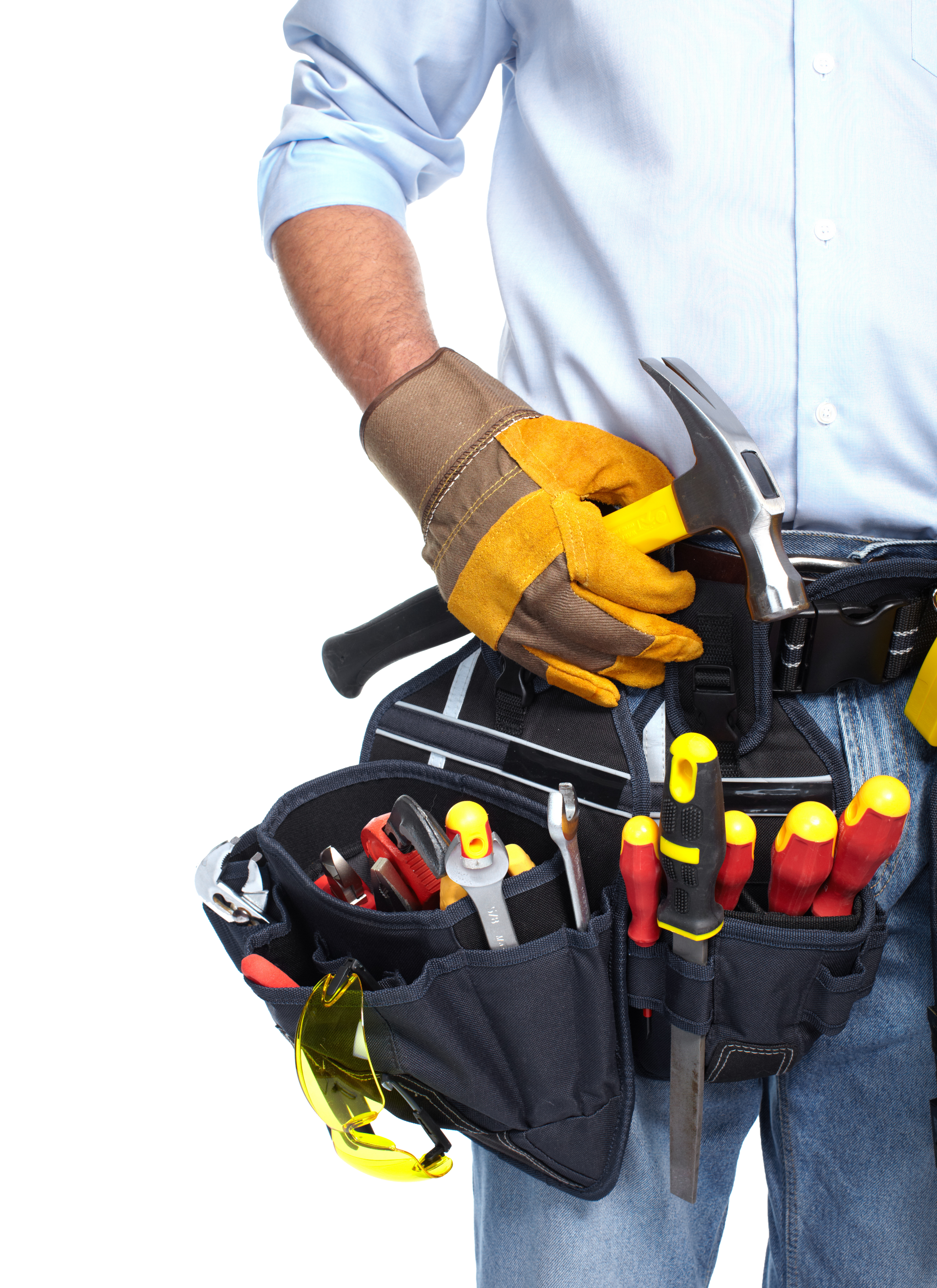 A man wearing gloves and a tool belt holds a hammer