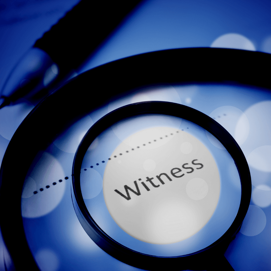 A magnifying glass with the word witness on it