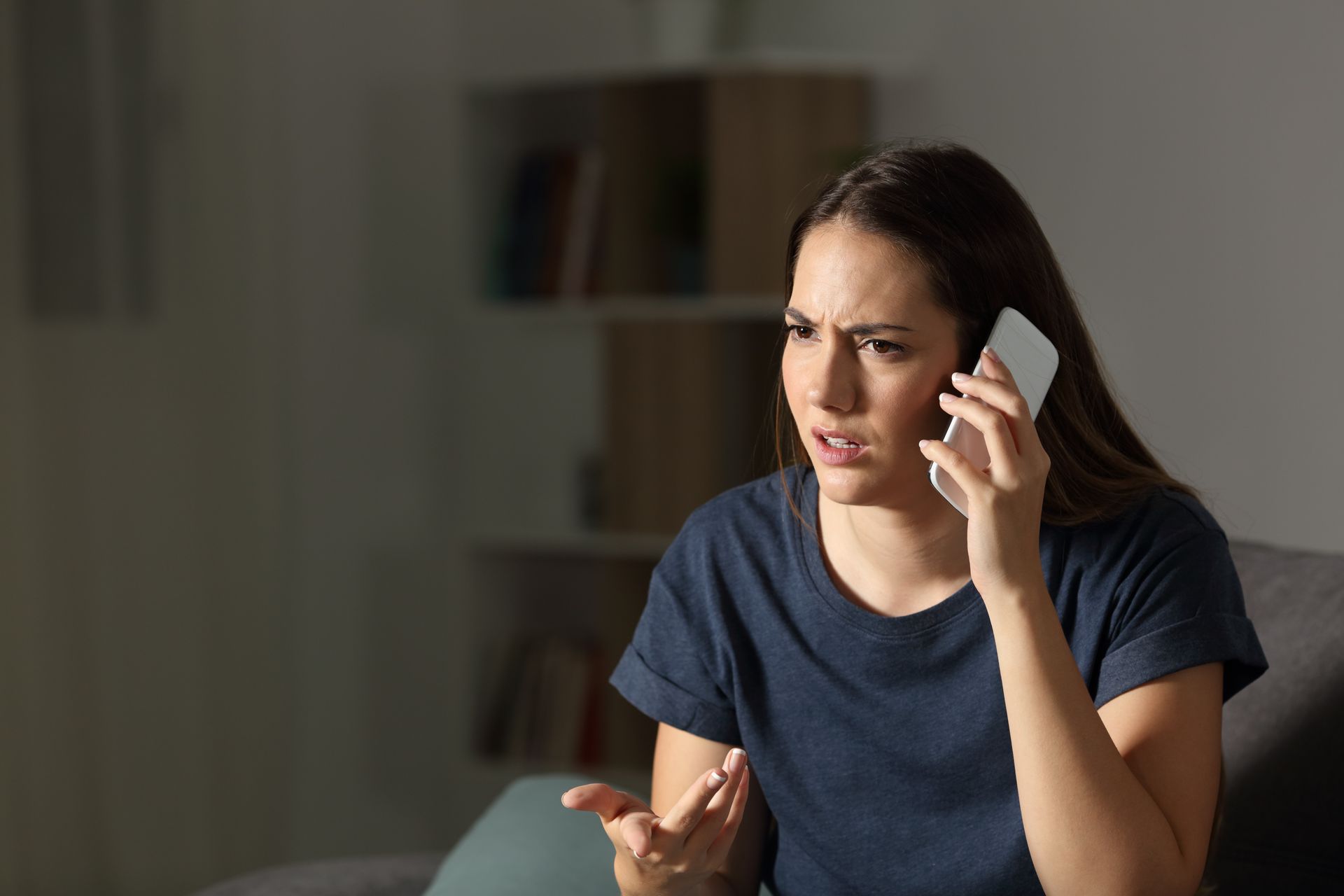 A woman talking on the phone at night A woman talking on the phone at night