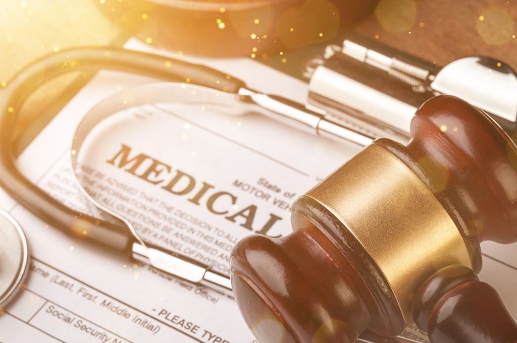 image of medical form with gavel