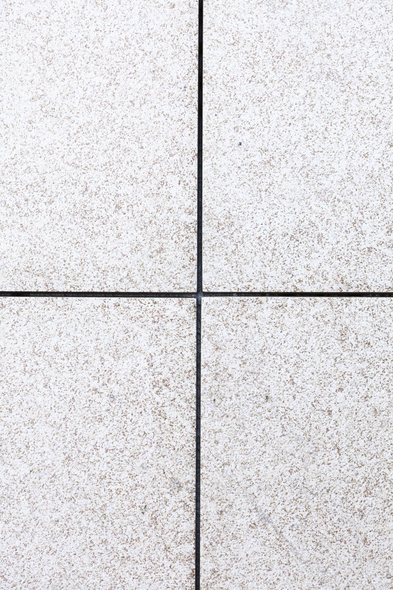 light colored tile sectioned into four squares
