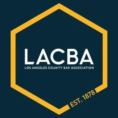 LACBA logo: white text on a dark blue background, within a yellow hexagon. 