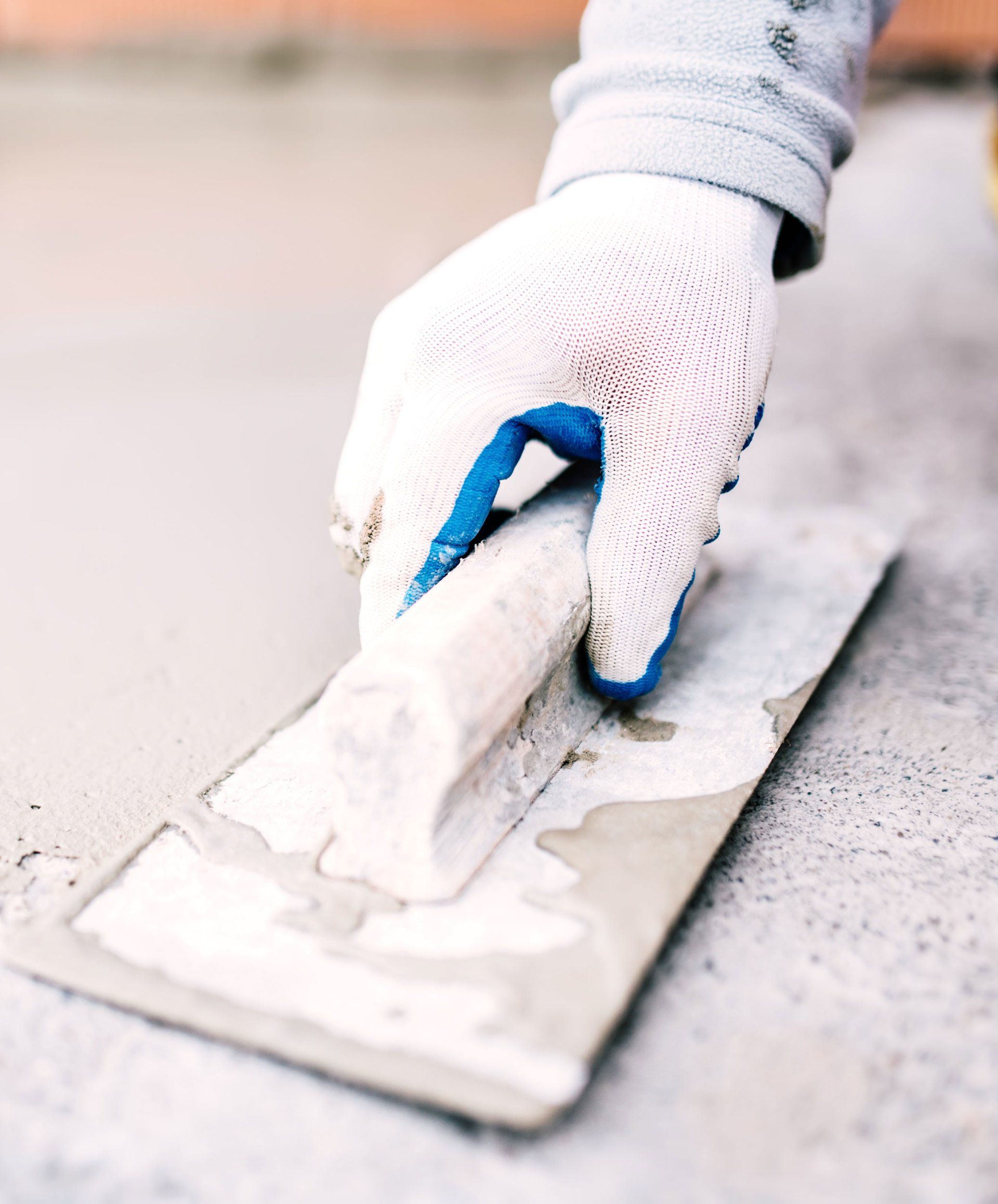 Wall Repair — Worker Repairing Cement Walls in Davenport, IA
