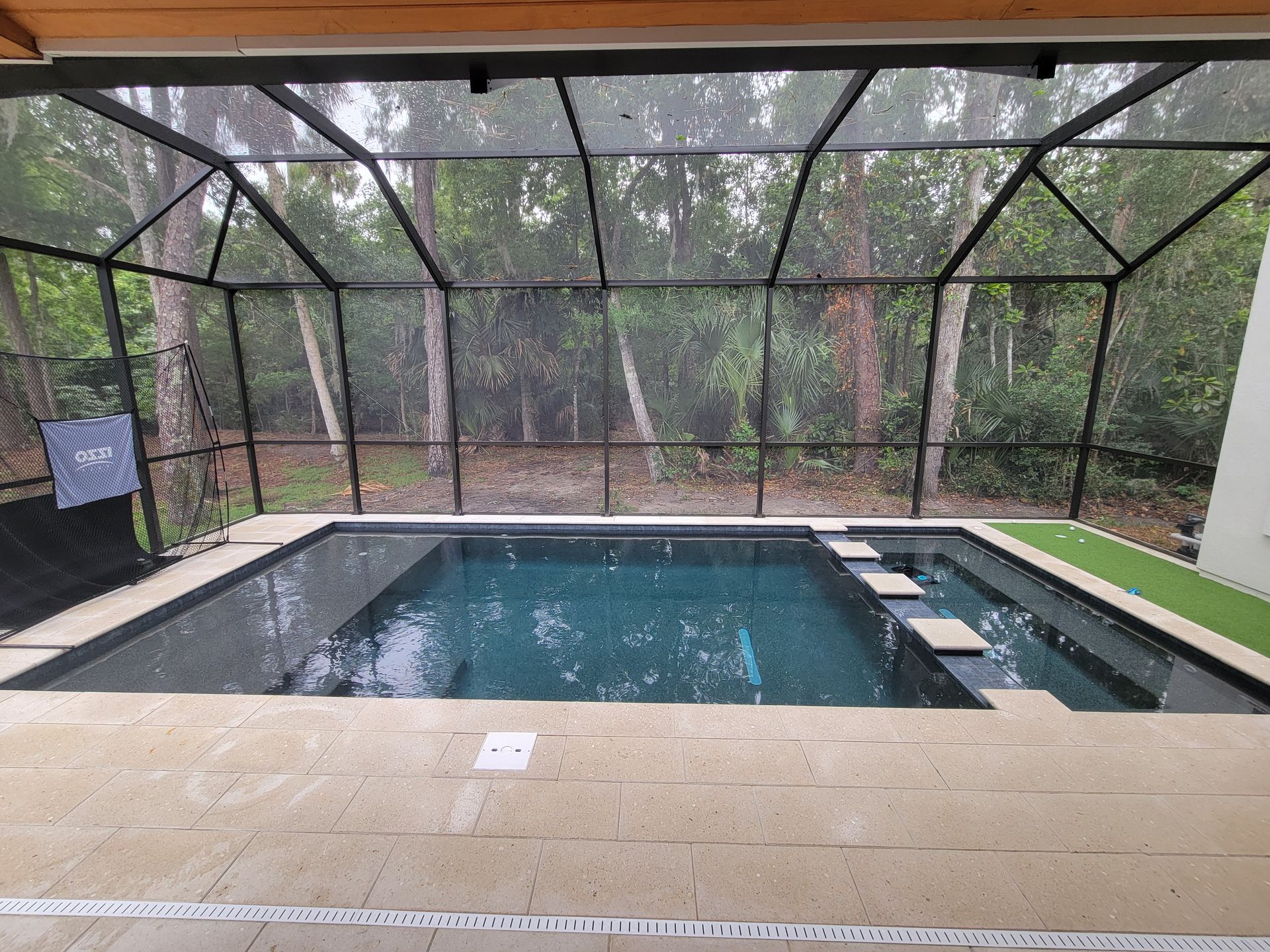Swimming Pool And Patio In The Backyard — Jacksonville Beach, FL — Taurus Pools