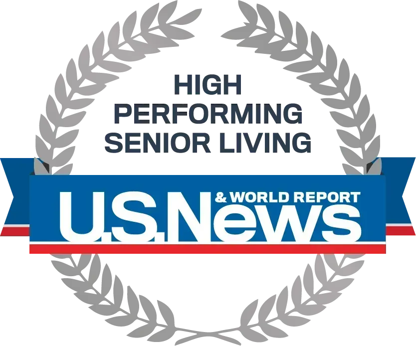 US News & World Report High Performing Senior Living award logo with gray laurel wreath and blue-red banner