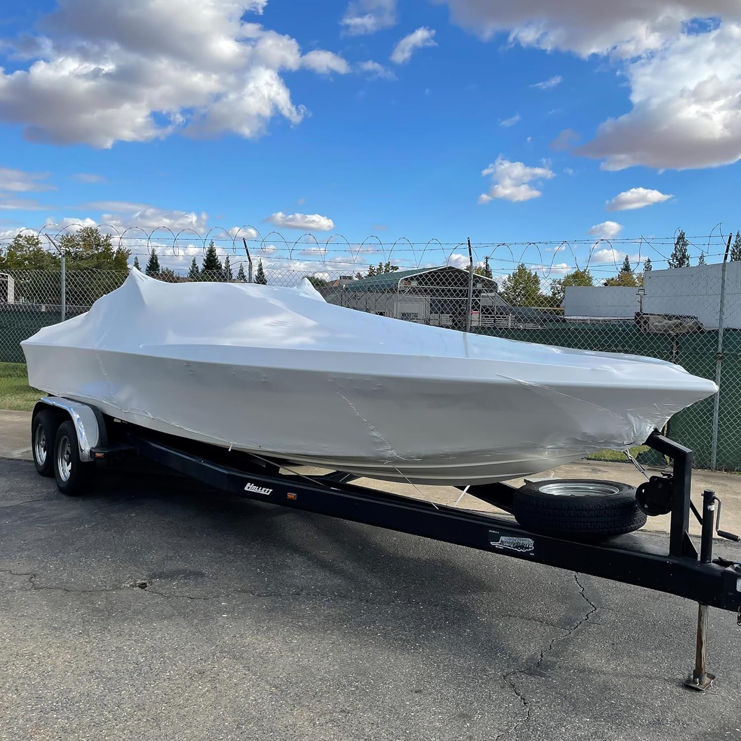Boat shrink-wrapped and prepared for winter storage at Cranberry Creek Marina, Huron, Ohio