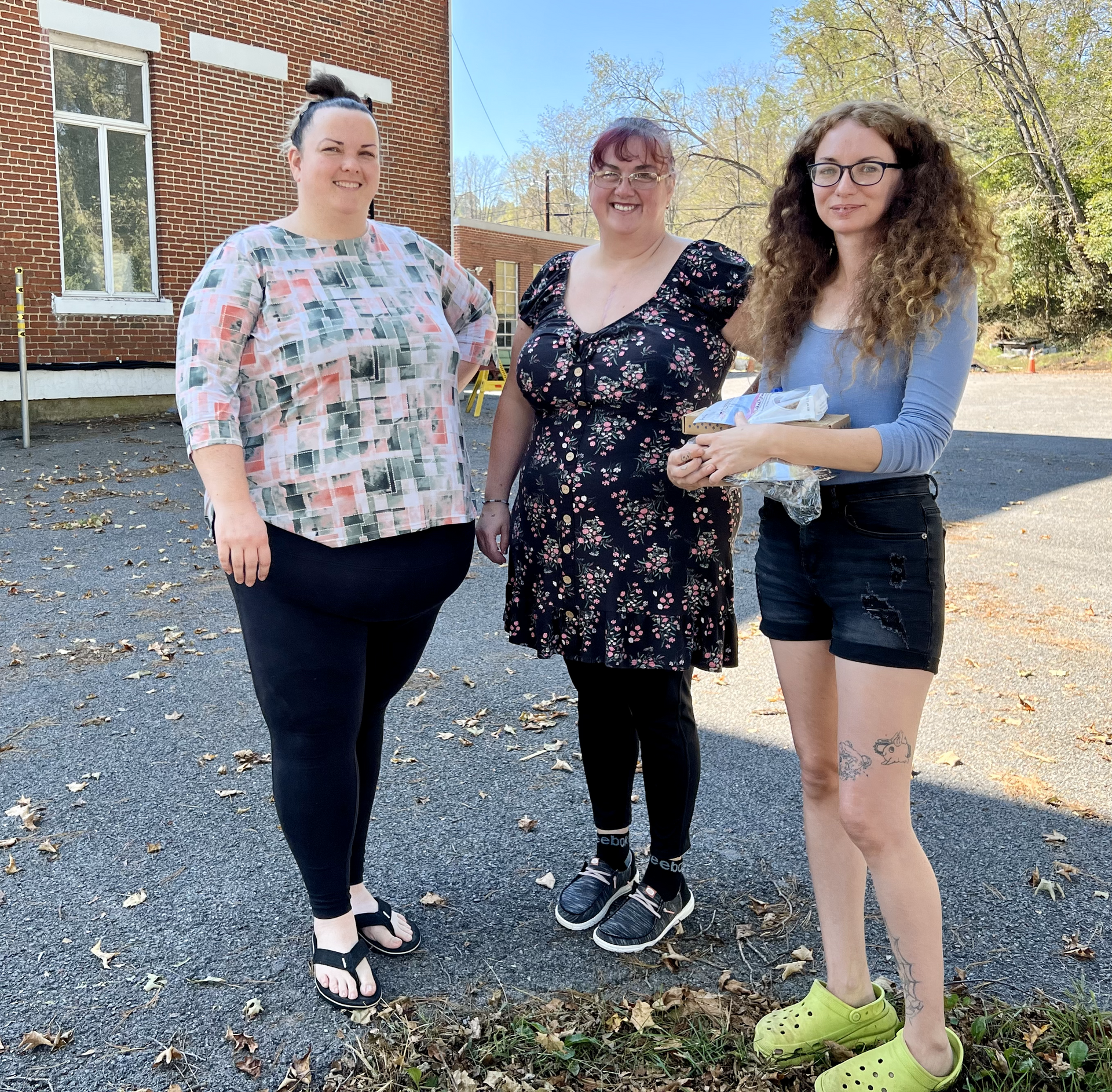 Three women at a volunteer event.
