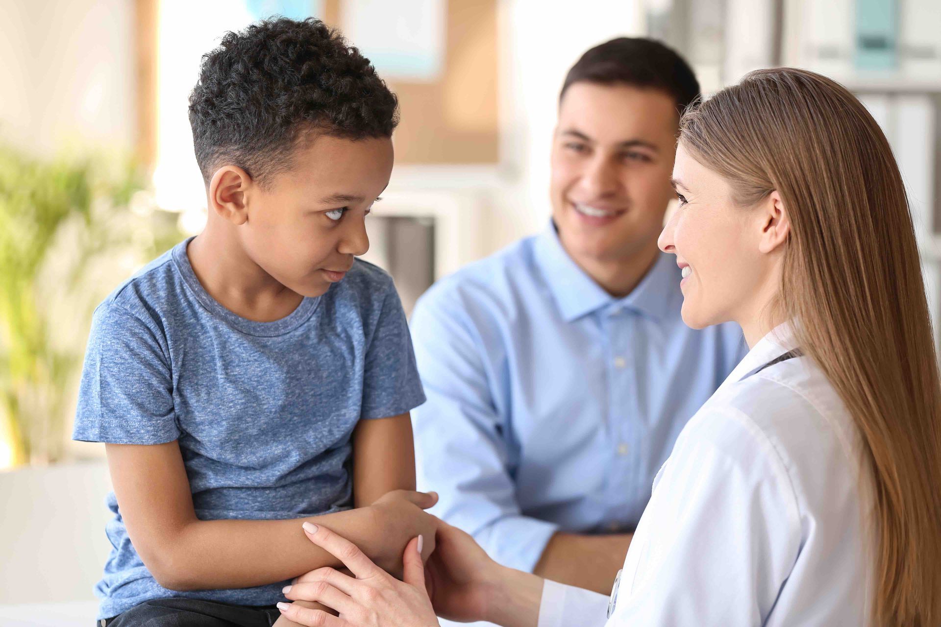 doctor looking at a child's arm